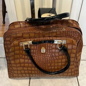 Rolling luggage or briefcase. Elegant animal skin design.
